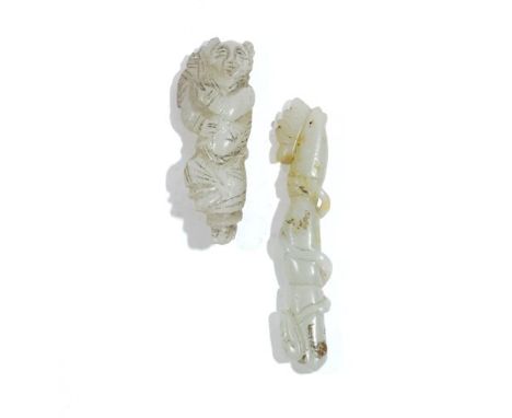 A Chinese pale green jade pendant Ming/Qing dynasty, as a dancing man in loose garments in Tang style, incised black details 