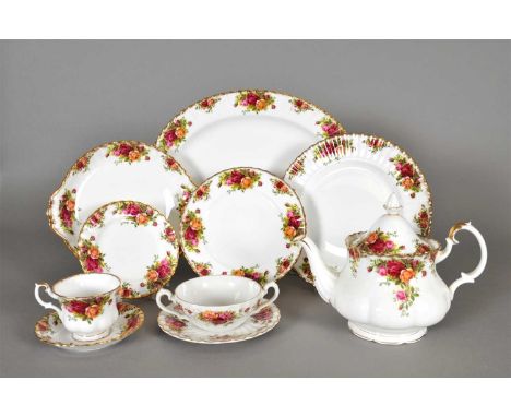 A Royal Albert Old Country Roses part tea and dinner service including teapot and cover, two sugar bowls, teacups, saucers, s