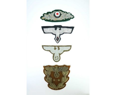 A German Third Reich RMBO (Eastern People’s) Sleeve Eagle together with a German Third Reich NSDAP eagle patch in silver bull