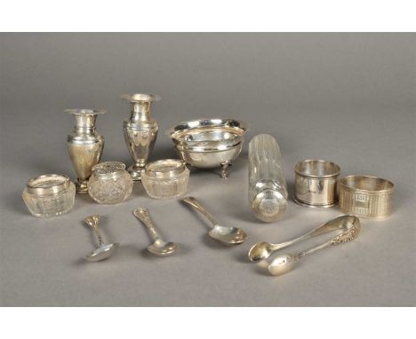 A silver sugar bowl with cusped rim, Mappin &amp; Webb, London, together with two silver vases, two silver mounted glass salt