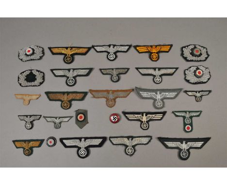 A collection of over 50 German Third Reich cloth badges – real and reproduction including Turkistan Foreign Volunteer Shield 