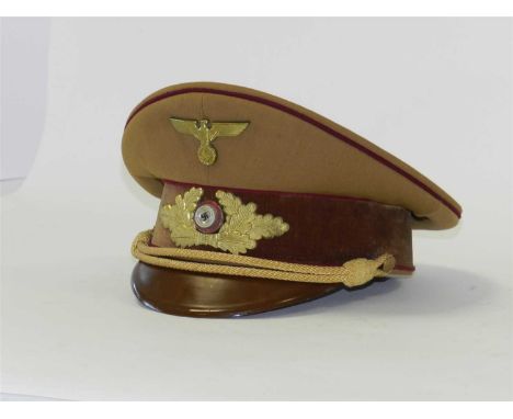 A German Third Reich NSDAP Political Leader’s Gauleitung level visor cap (circa 1939-45) constructed of standard brown unifor