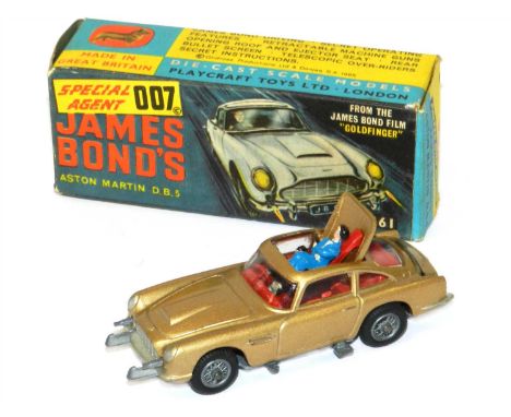 Corgi 261 James Bond Goldfinger Aston Martin DB5 - gold body, red interior complete with James Bond and villain figures, wire