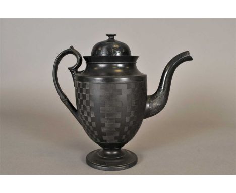 A large English black basalt coffee pot and cover circa 1800-20, with engine-turned chequered design to the main body and cov