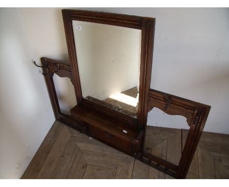 1930s oak framed hall mirror with bevel edged mirror panel above shelf, with hat and coat racks (106cm x 89cm)