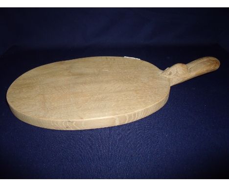 Carved oak Robert Thompson 'Mouseman' oval cheese board with raised handle (40cm x 21cm) 