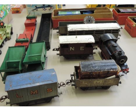 A Hornby O gauge electric 0-4-0 LMS tank engine and a selection of Hornby O gauge rolling stock including breakdown van and c