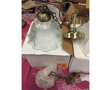 2 boxed light fittings with shades