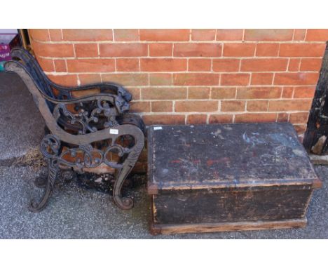 A pair of bench ends and a vintage tool box