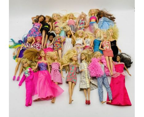 A collection of modern Mattel Barbie dolls