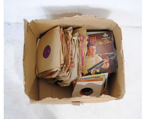 A collection of 78rpm gramophone records including Bill Haley and His Comets, The Everly Brothers, Fats Domino, Elvis Presley