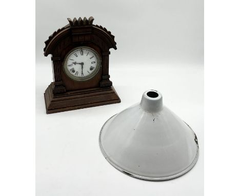 A vintage enamel light shade along with a wooden cased Ansonia Clock Co. mantle clock 