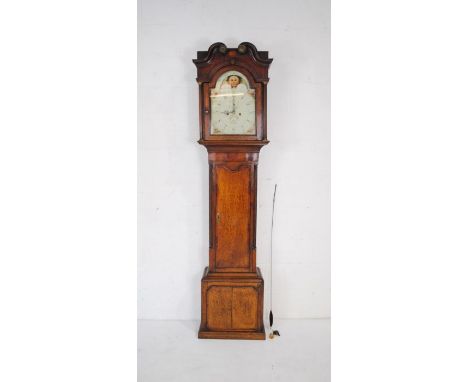 A Georgian oak longcase clock with inlaid detailing and painted dial named to 'E. Mathews, Welchpool' with moon phase - heigh