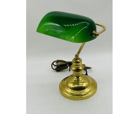 A vintage bankers lamp with green shade