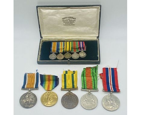 A group of 5 WWI &amp; WWII medals with corresponding miniatures awarded to 2nd Lieutenant JW McWalter HLI (Highland Light In