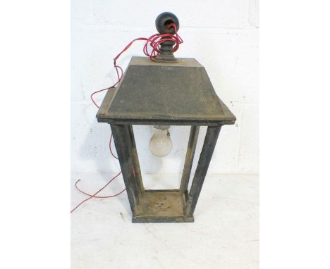 A vintage street lamp style outside lamp, no glass.