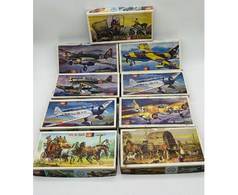 A collection of nine vintage boxed UPC (Universal Powermaster Corp.) plastic models construction kits (1:50 scale) including 