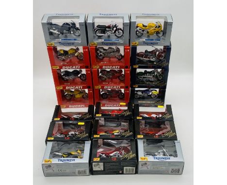 A collection of twenty one boxed Maisto die-cast and plastic motorcycles (1:18 scale) including Ducati, Triumph, Yamaha, BMW,