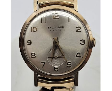 A 9ct. gold Excalibur gentleman's wrist watch, manual movement, having signed silvered Arabic numeral dial and subsidiary sec