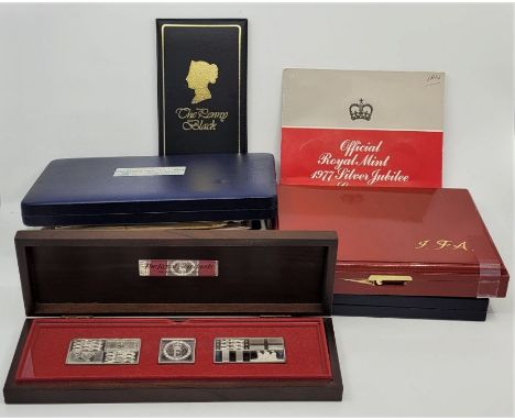 "The Royal Standards", The Danbury Mint, a silver proof three ingot collection, in fitted box, together with "The Queen's Sil