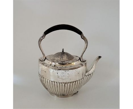 A Victorian silver kettle, by William Hutton & Sons, London 1890, of oval semi-fluted form, (gross weight 758.2g)Condition no