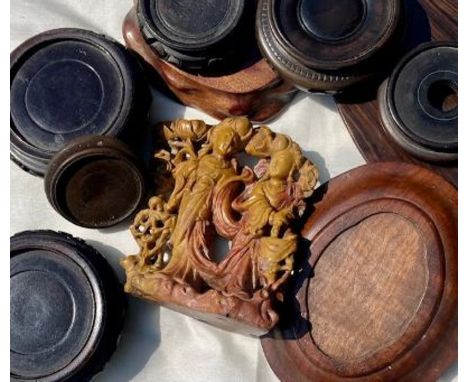 A collection of Chinese items to include wooden stands, soapstone and a Chinese 20thc cent lamp base