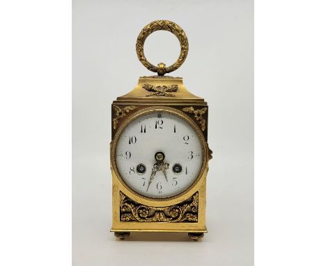 A late 19th century French ormolu officer's&nbsp;clock, bell strike, having white enamel Arabic numeral dial with outer minut