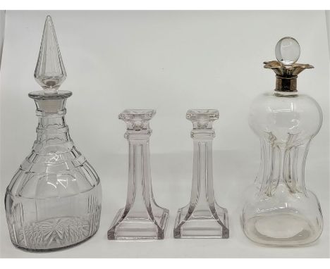 A silver mounted glass "cluck-cluck" decanter, Chester 1911, makers mark rubbed, with stopper, height 29.5cm, together with a