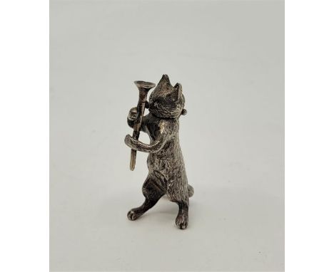 An Edward VII novelty silver vesta, import marks for London 1901, sponsors mark for Theodor Hartmann, modelled as a cat music