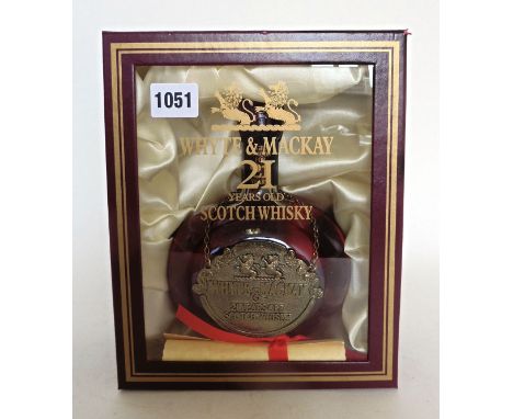 A bottle of Whyte & Mackay 21 yr old Scotch Whisky in presentation box with scroll circa 1980's 43% 75cl