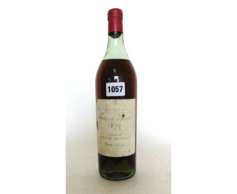 An old bottle of Very Choice Old Liqueur Brandy Cognac 1870 bottled in Cognac & shipped by Roullet Delamain. This bottle is e