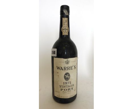 A bottle of Warre's 1975 Vintage Port bottled for Percy Fox & Co Ltd London (ullage into neck)