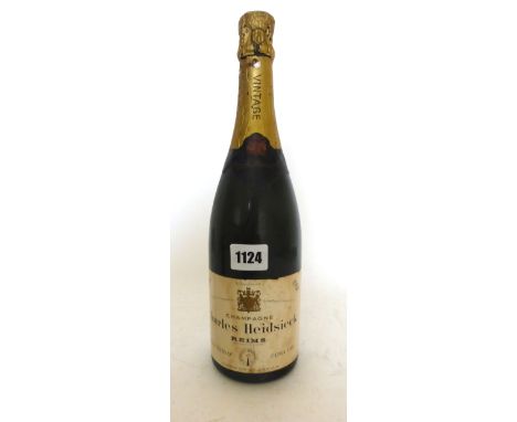 A bottle of Charles Heidsieck Finest Extra Dry Vintage 1964 Champagne 