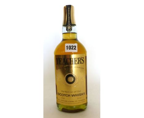 A bottle of Teacher's Highland Cream Scotch Whisky with label to certify it comes from the millionth case sold on the 6th Dec