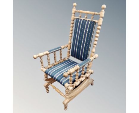 A vintage bobbin-turned rocking chair. 
