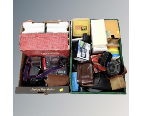 Two boxes containing vintage cameras, photographic equipment, a Eumig projector, Garmin satnav etc. 