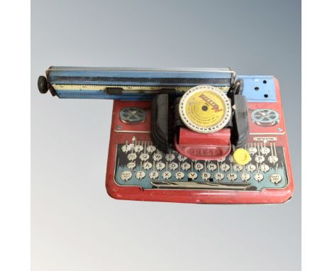 A mid century Mettype junior tin plated toy typewriter 