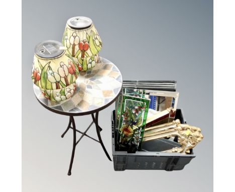 A crate containing contemporary framed and unframed mirrors, a mosaic topped occasional table and two Art Deco style lights. 