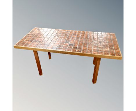 A Scandinavian tile topped coffee table. 