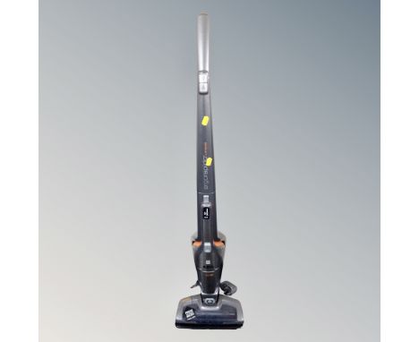 An AEG LI-35 Ergorapdo lithium two in one upright cordless electric vacuum together with two Bissell featherweight bagless st