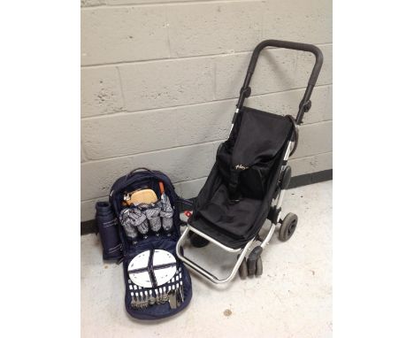 A play market folding light weight shopping trolley together with a picnic set in carrier bag. 