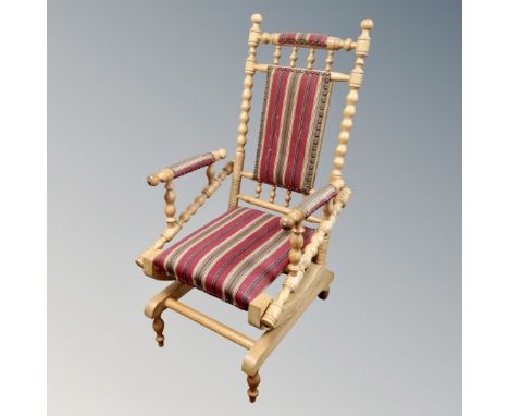 A vintage bobbin-turned rocking chair. 