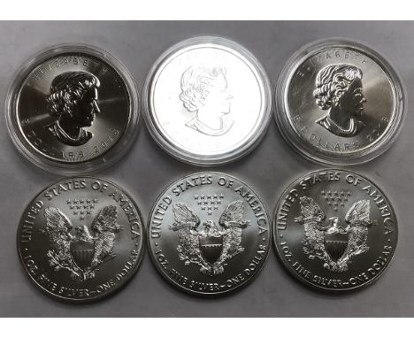 Silver Bullion Coins of Three US Walking Liberty Eagles and Three Canadian Maple Leaf all 1oz Fine Silver.