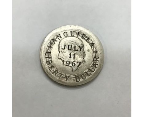 Scarce Anguilla Liberty Dollar struck on a Mexican 1952 Five Peso    The so-called Anguilla Liberty Dollar was initiated as a