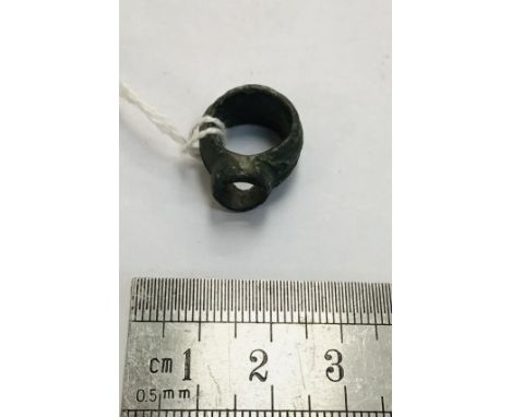                         Roman copper alloy ring missing what would likely have been an intaglio stone. W6g.20mm x 16mm. Ring 