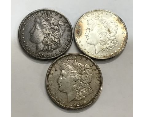 Three US Silver Morgan Dollars including 1882, 1889 &amp; 1921 all weighing between 26.58g and 26.72g