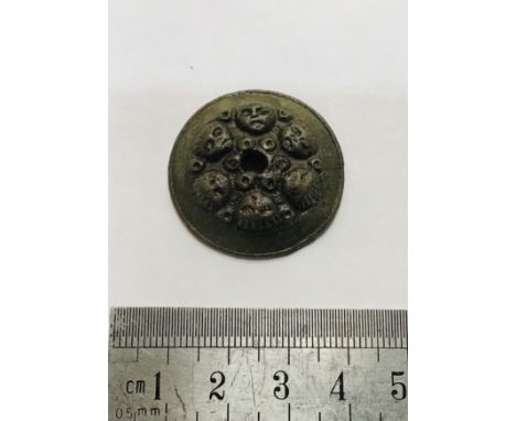                         Iron Age Celtic Mount. Circa 100 BC. Copper-alloy, 7.81 grams. 31.18 mm. A rare and beautiful piece o