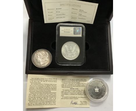 A 1921 US silver Morgan dollar Slabed in Case with Certificate with a silver 1889 Morgan dollar and a proof 40th Coronation a