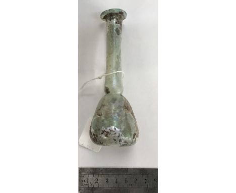                         A Roman green glass Ungentarium of the candlestick style with a long neck (15mm) and bulbous base (47