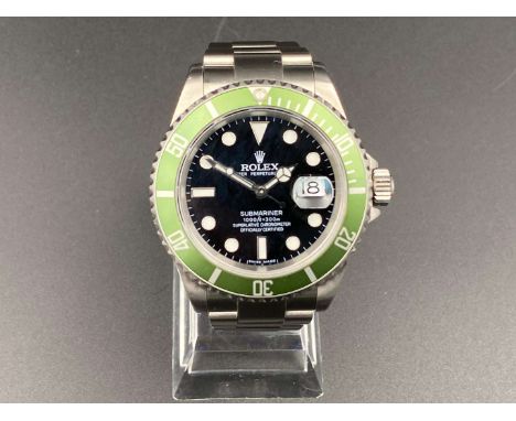         Summary:The jewelled automatic movement (unseen) to a signed gloss black dial with luminous markers, infilled hands a